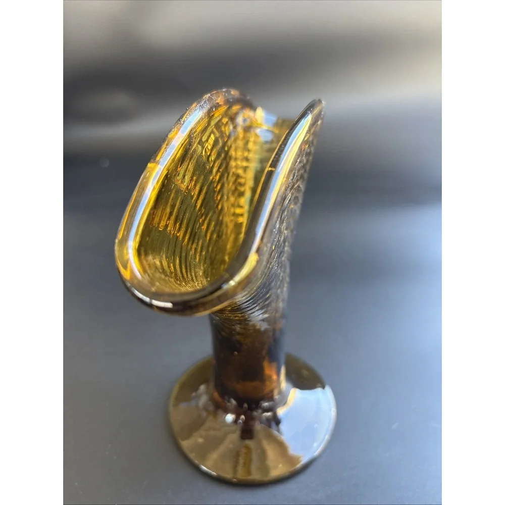 Mid-Century Modern Amber Glass Fan Vase featuring an optic ribbed pattern.